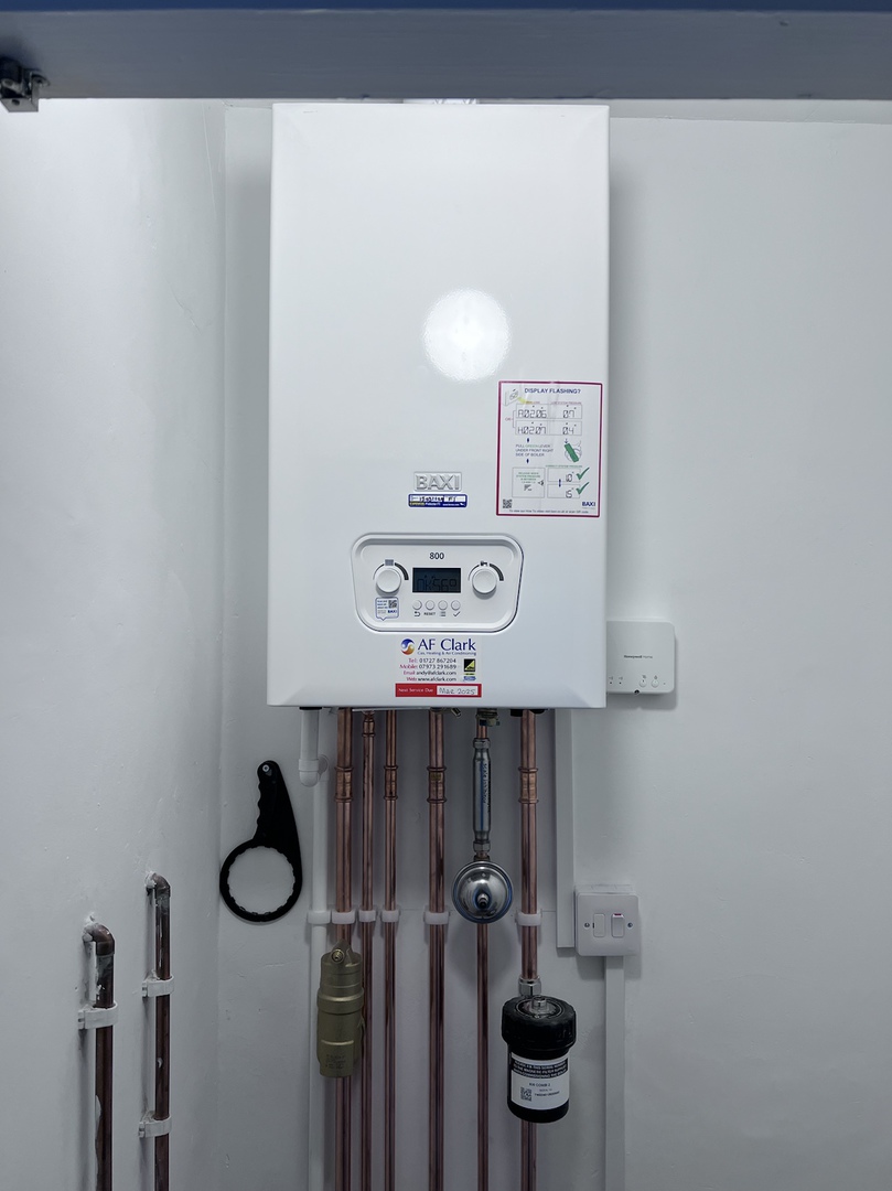Baxi boiler installation with AF Clark Ltd service label